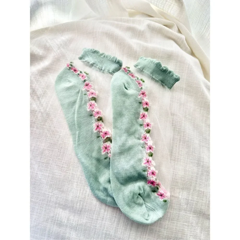 Light green sheer socks with pink flowers